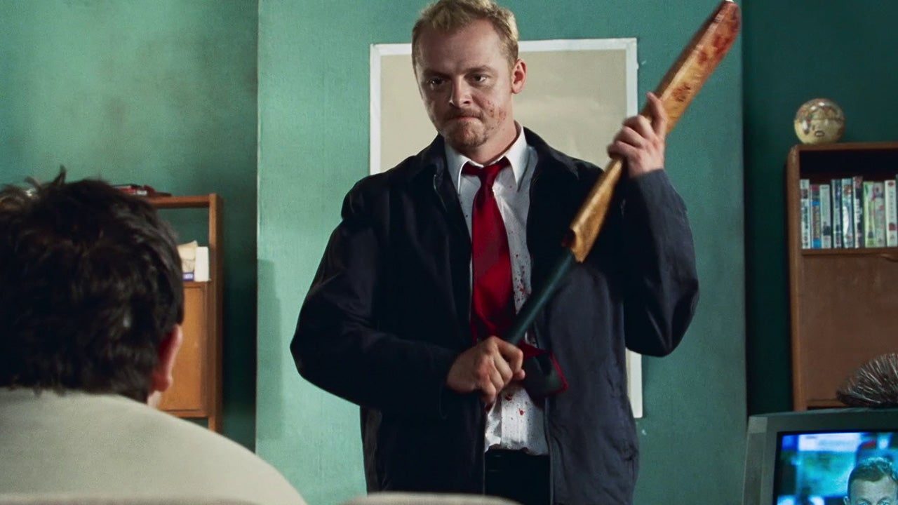 Simon Pegg wields a cricket bat in Shaun of the Dead (2004).
