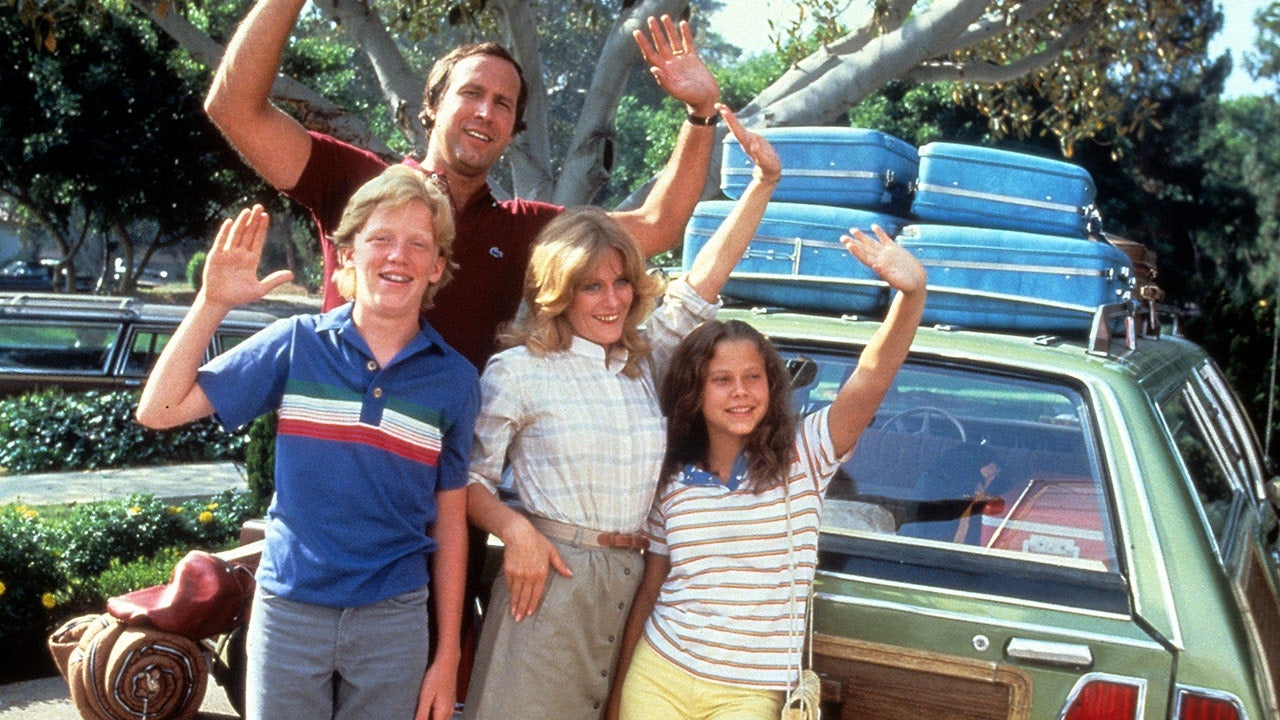 The Griswold family waves in National Lampoon's Vacation (1983).
