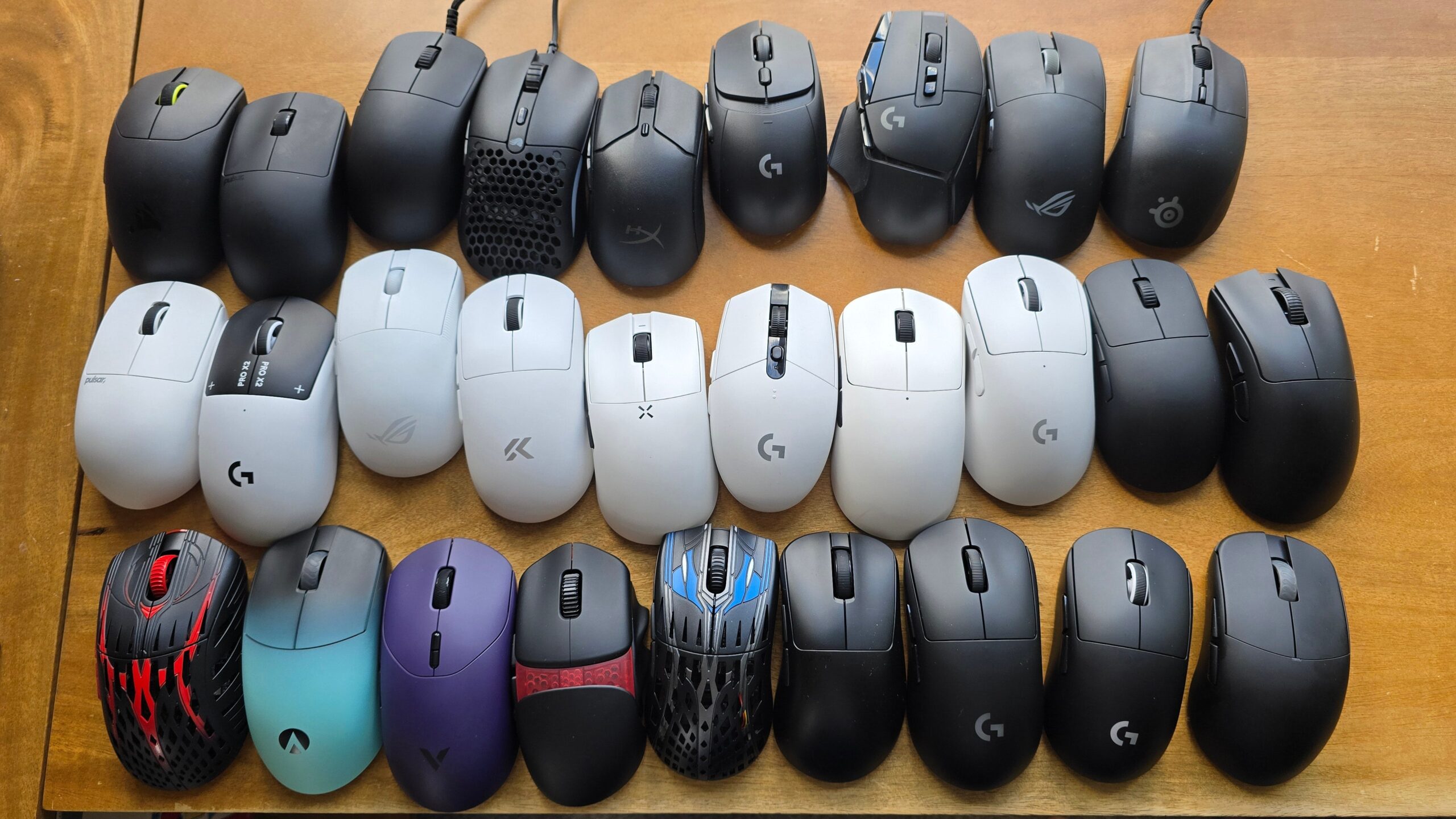 A picture of 28 different gaming mice, all of which (among others) were tested for this guide.